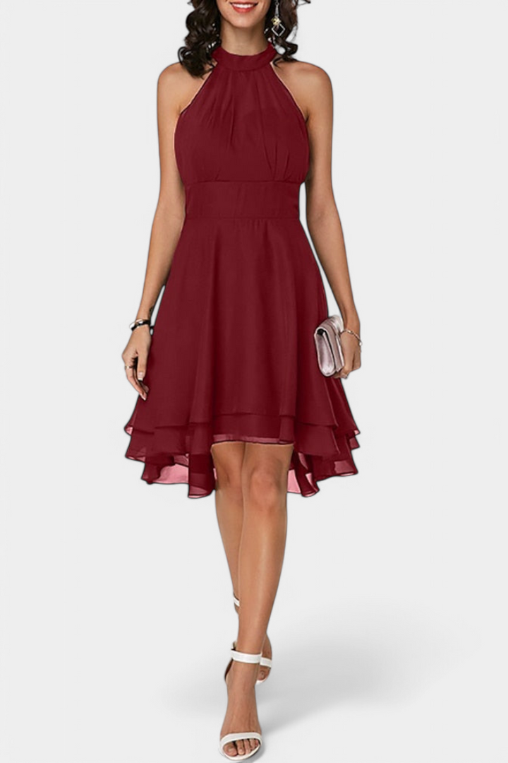 Vestido Anouk de noche con silueta ajustada, resaltando la figura. Elegancia formal para mujer.
