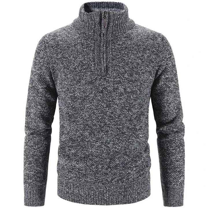 Jersey de hombre gris con cremallera. Diseño práctico y cómodo para un look casual o semi-formal de invierno.