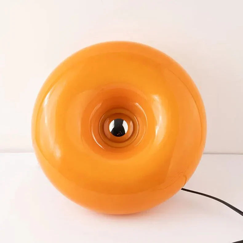 Decoración minimalista con lámpara LED donut, para mesa o pared, luz fría eficiente y regulable.