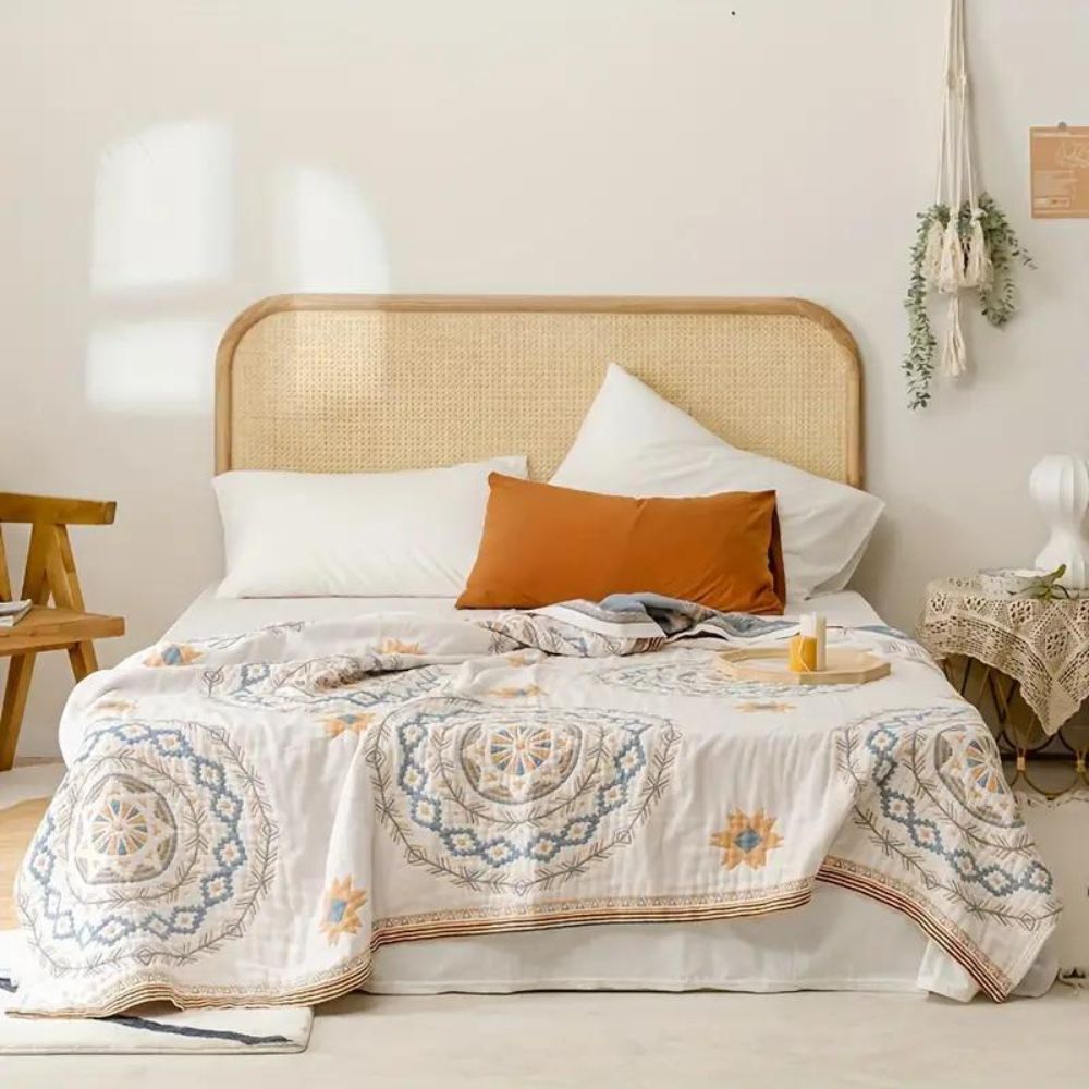 Manta de algodón transpirable con diseño de mandala para sofá. Textil bohemio y ligero para un ambiente zen en casa.