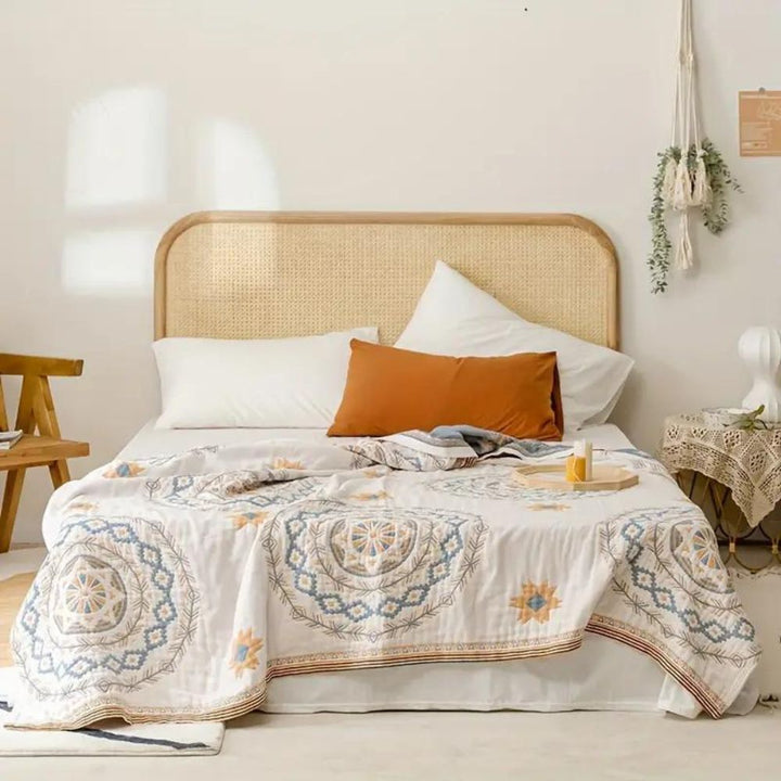Manta de algodón transpirable con diseño de mandala para sofá. Textil bohemio y ligero para un ambiente zen en casa.