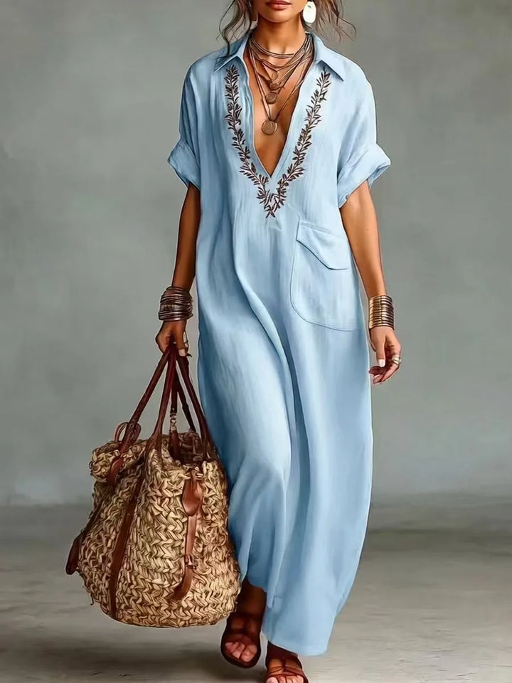 Vestido largo boho de mujer con efecto lino, bordado floral y bolsillos. Ideal para verano, playa y vacaciones.