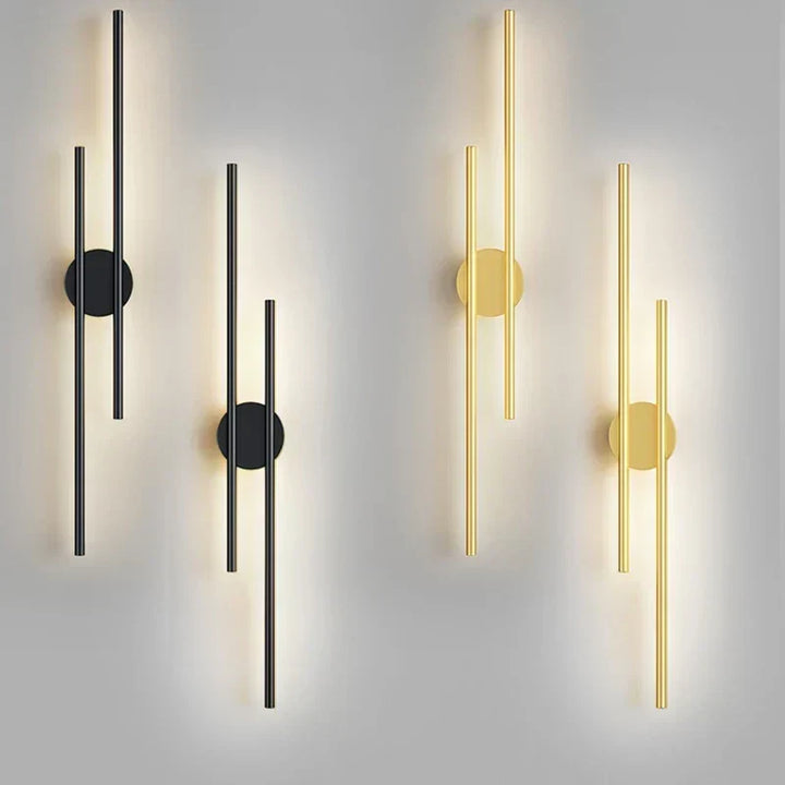 Iluminación contemporánea: lámpara de pared LED negra y dorada con doble haz. Ideal para ambientes modernos.