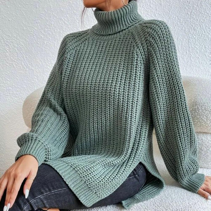 Suéter de cuello alto de mujer en mezcla de algodón, estilo elegante y moderno, disponible en varios colores.