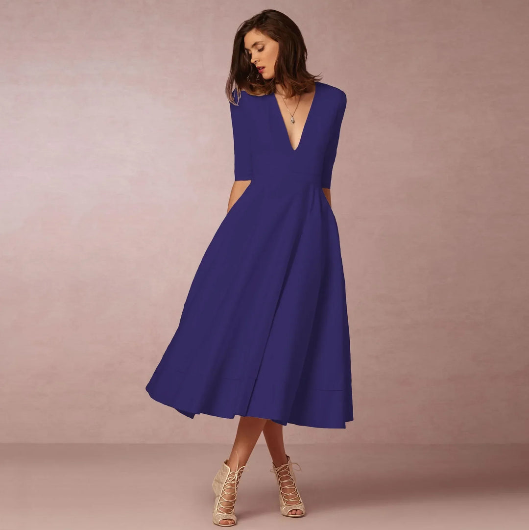 Vestido midi de fiesta para mujer, con escote en V y mangas a media manga. Estilo sofisticado y cómodo.