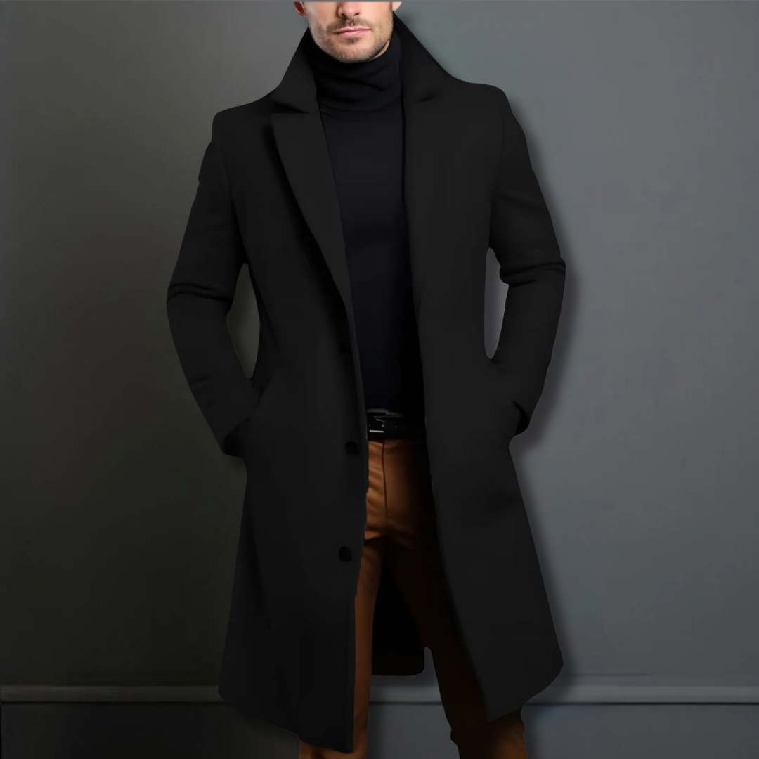 Abrigo largo negro para hombre, estilo formal y moderno. Gabardina oscura ideal para vestir elegante en invierno.
