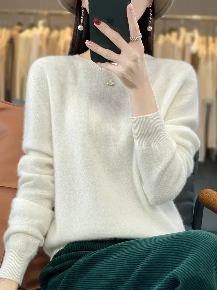 Jersey de mujer, cuello redondo, cálido, perfecto para mantenerse abrigada con estilo.