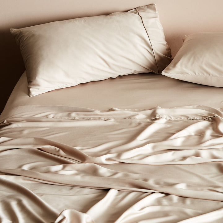 Fundas de almohada refrescantes de bambú y lyocell, satén hipoalergénico para un descanso óptimo.