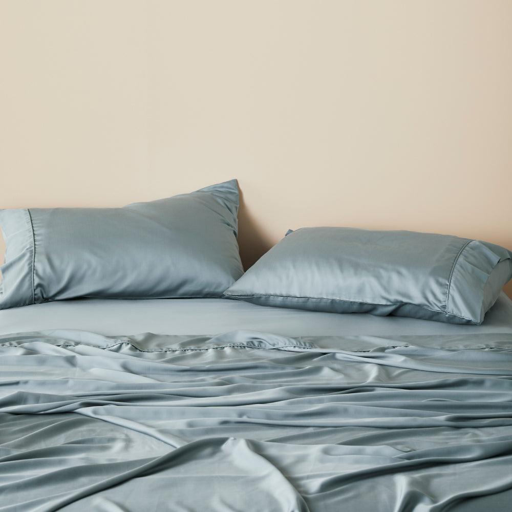 Funda de almohada de bambú sostenible, lyocell satén suave y ecológico.
