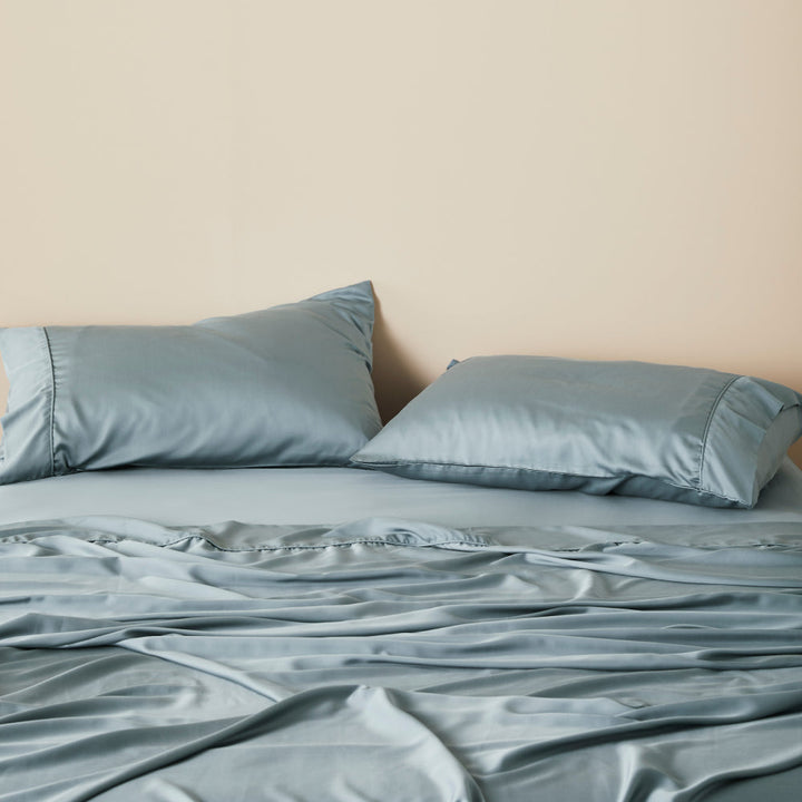 Funda de almohada de bambú sostenible, lyocell satén suave y ecológico.