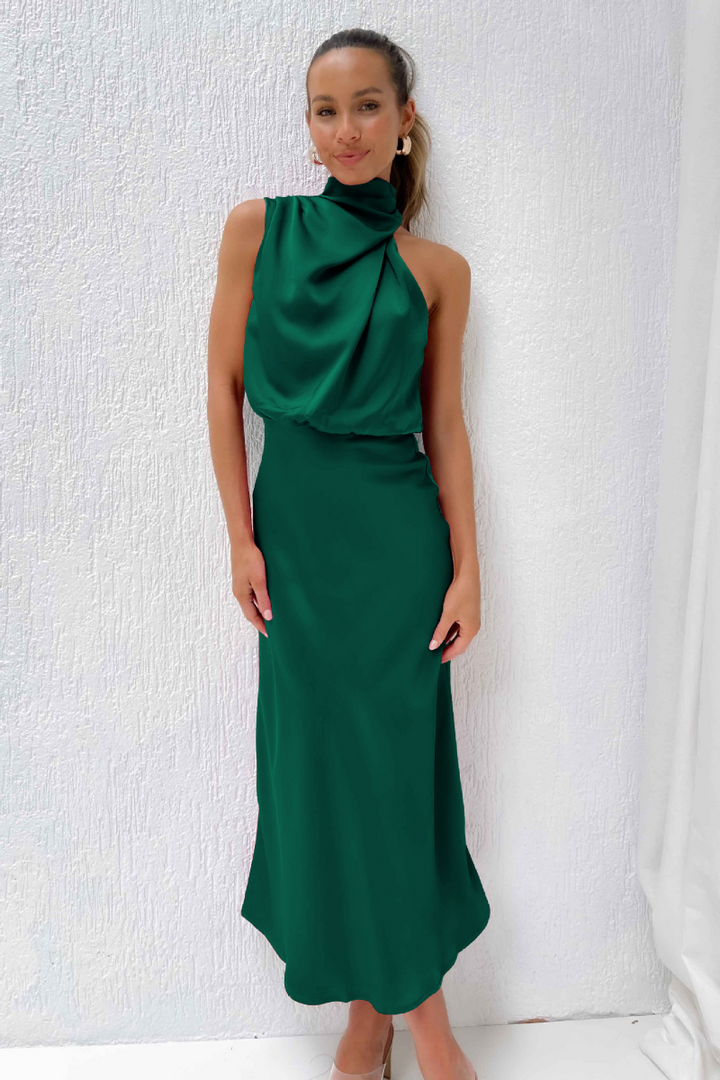 Elegante vestido midi Luzielle con escote asimétrico. Ideal para eventos de verano y moda femenina.