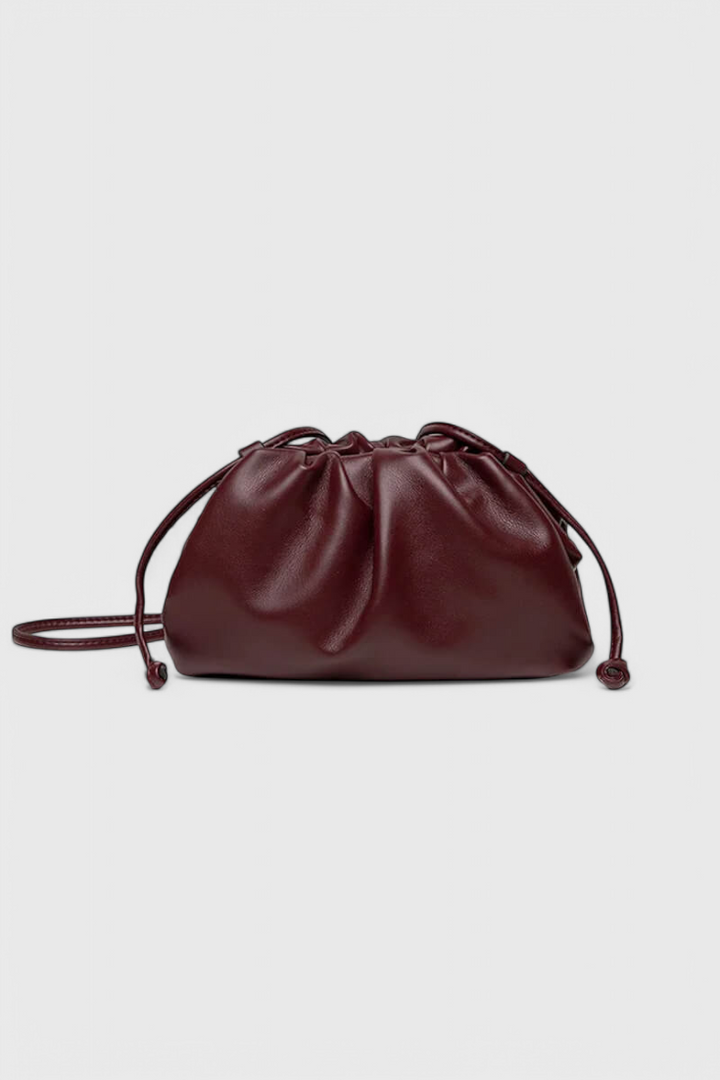 Bolso cruzado compacto para mujer, diseño moderno y elegante, ideal para uso diario y estilo chic.
