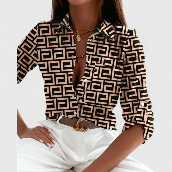 Camisa de mujer con estampado geométrico y manga larga, ideal para un estilo casual y versátil de primavera-otoño.