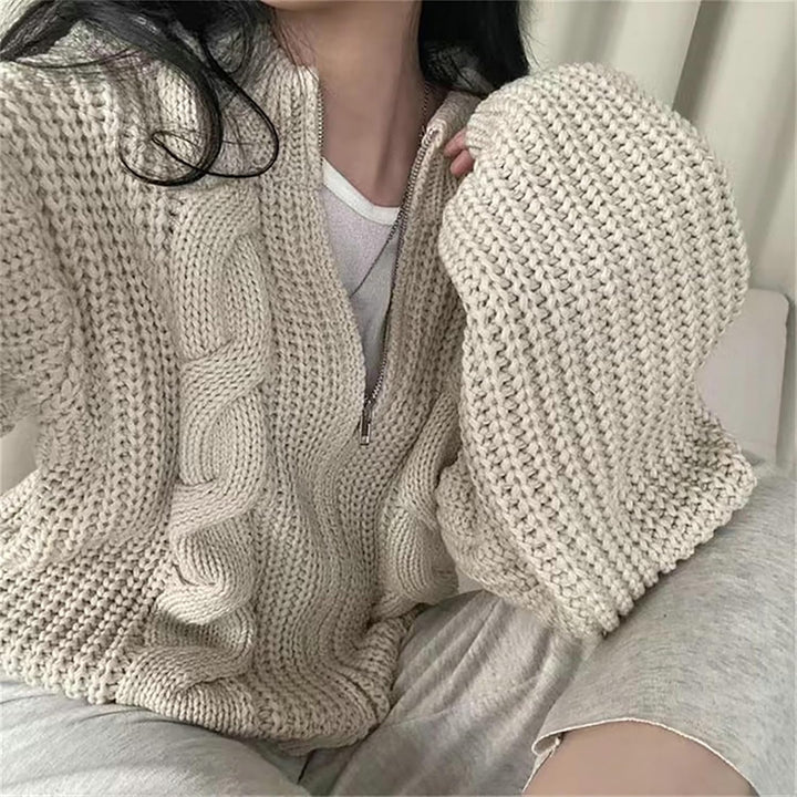 Cárdigan de punto oversize con cremallera para mujer, en tono rosa, estilo moderno y cómodo.