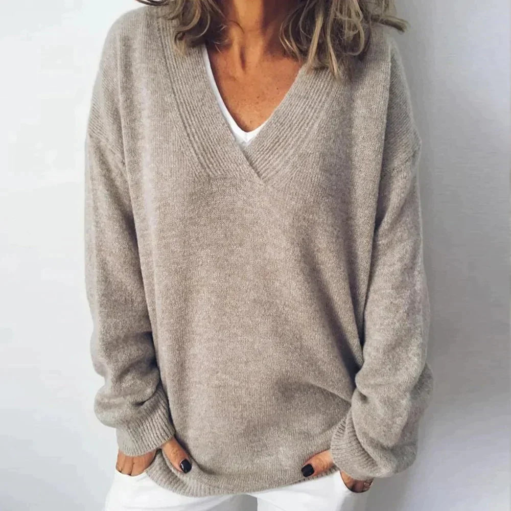Jersey de punto para mujer con cuello V y manga larga, estilo casual y cómodo para el otoño.