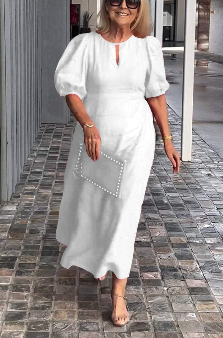 Vestido midi Sofía fluido, con caída elegante y cómoda. Ropa femenina versátil para un look chic y sofisticado.