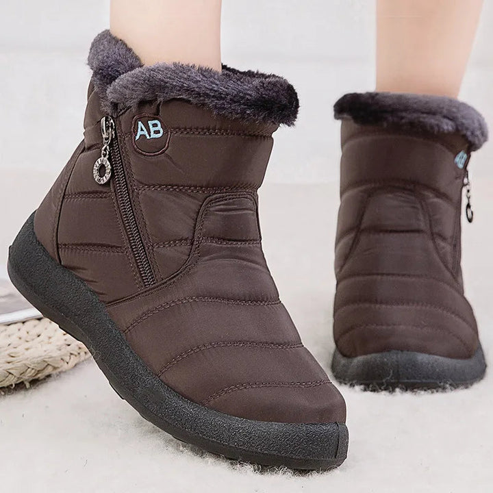 Botas de invierno antideslizantes para mujer, color negro, ideales para nieve y frío extremo.