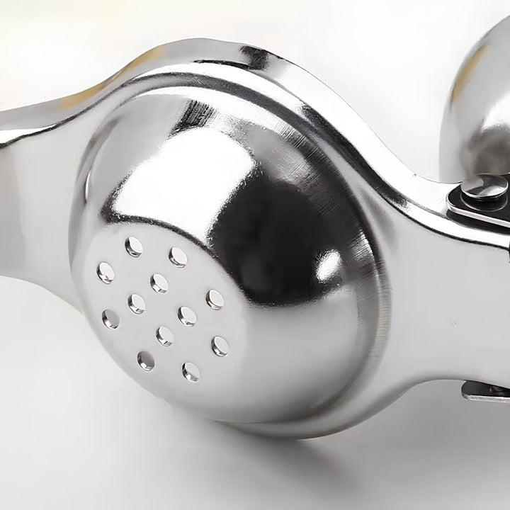 Exprimidor de acero inoxidable duradero, diseñado para la extracción eficiente de jugo de limón.