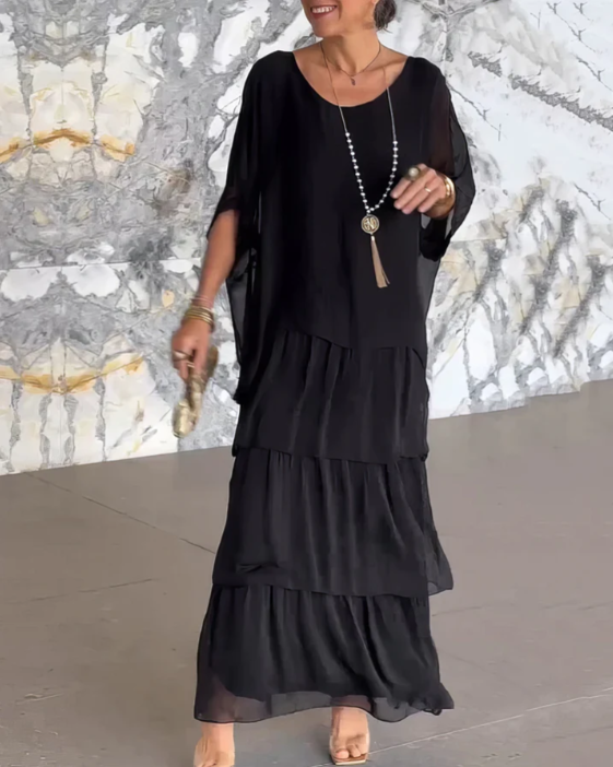 Vestido largo fluido para mujer, ideal para eventos elegantes o casuales.