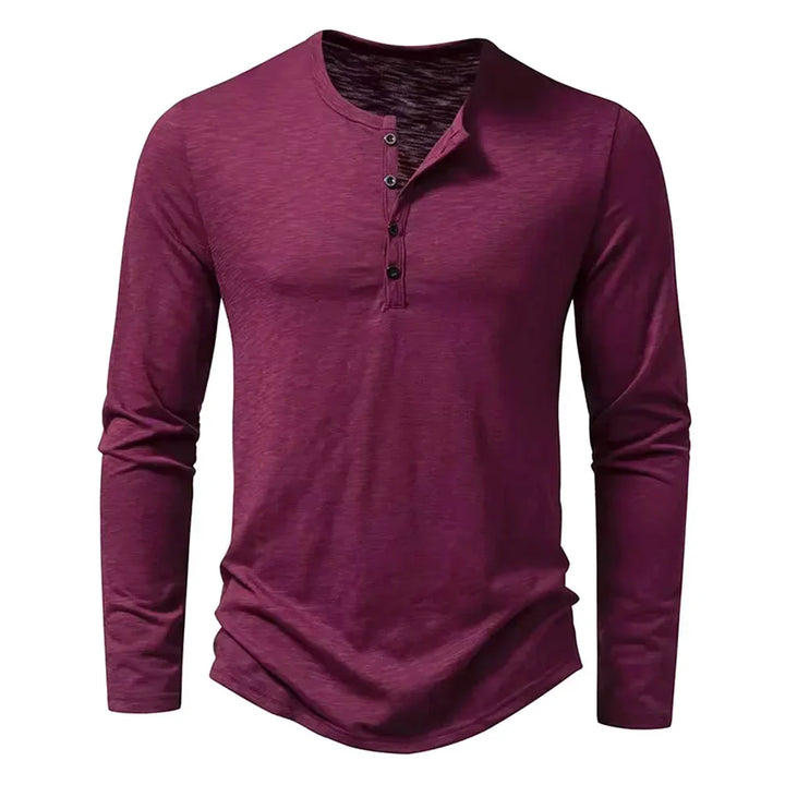 Camiseta versátil de manga larga para hombre, con botones en el escote. Prenda transpirable para un look diario.