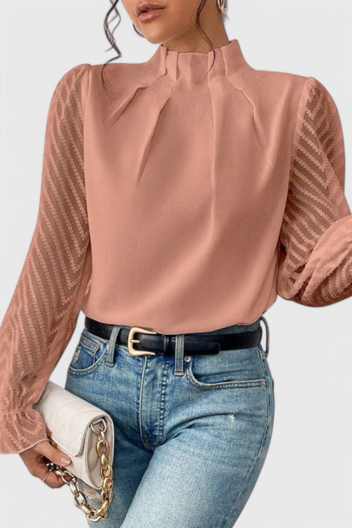 Blusa de manga larga para mujer, estilo náutico versátil, ideal para look casual o elegante.