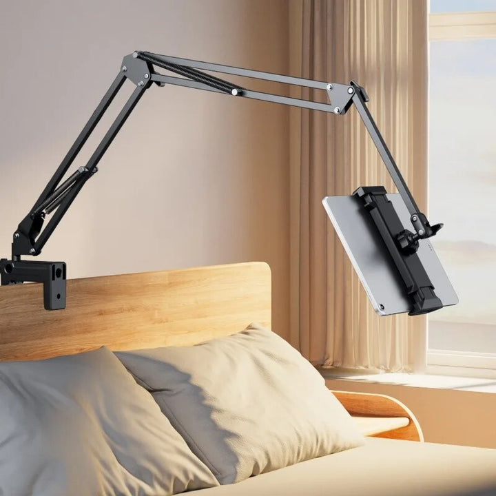 Soporte universal para tablet con brazo ajustable y rotación 360°. Ideal para escritorio y cama.