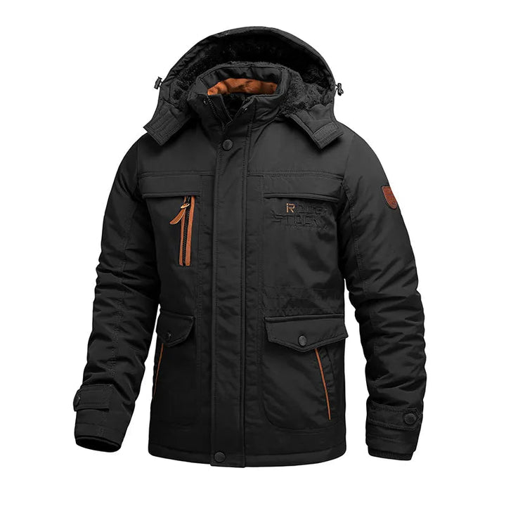 Abrigo táctico impermeable de invierno para hombre, ideal para senderismo y aventura en la montaña.
