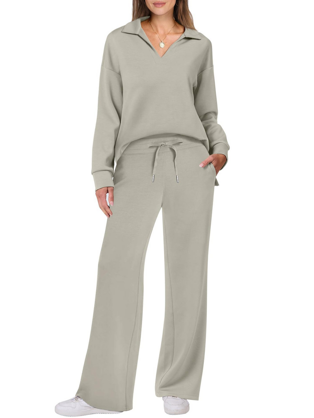 Conjunto dos piezas de punto para mujer: suéter cuello V manga larga y pantalón ancho. Moda casual cómoda.