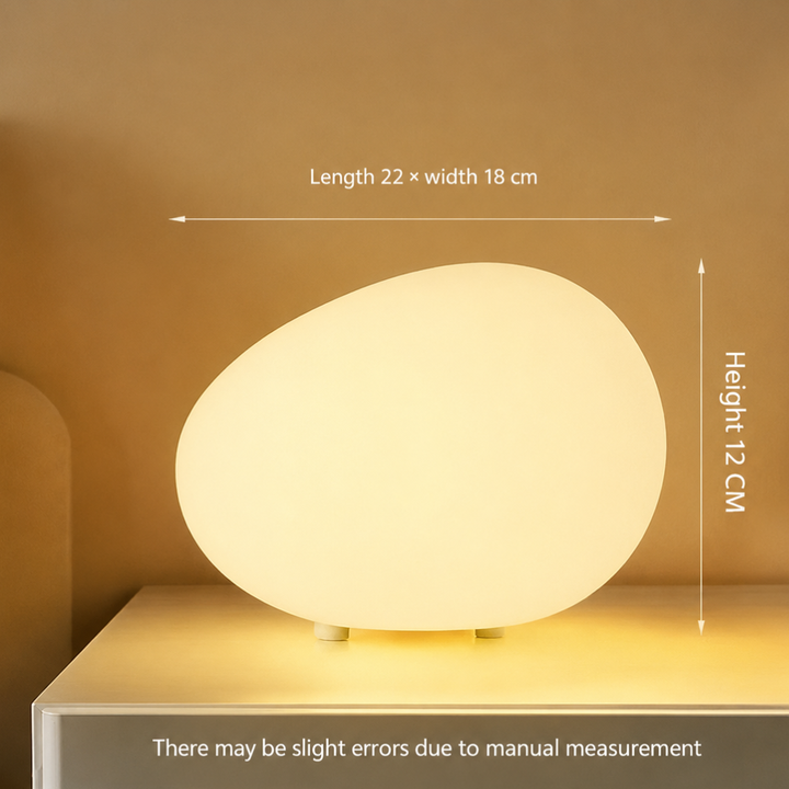 Lámpara de mesa LED 'Pebble' con estilo escandinavo. Luz ajustable para decoración moderna.