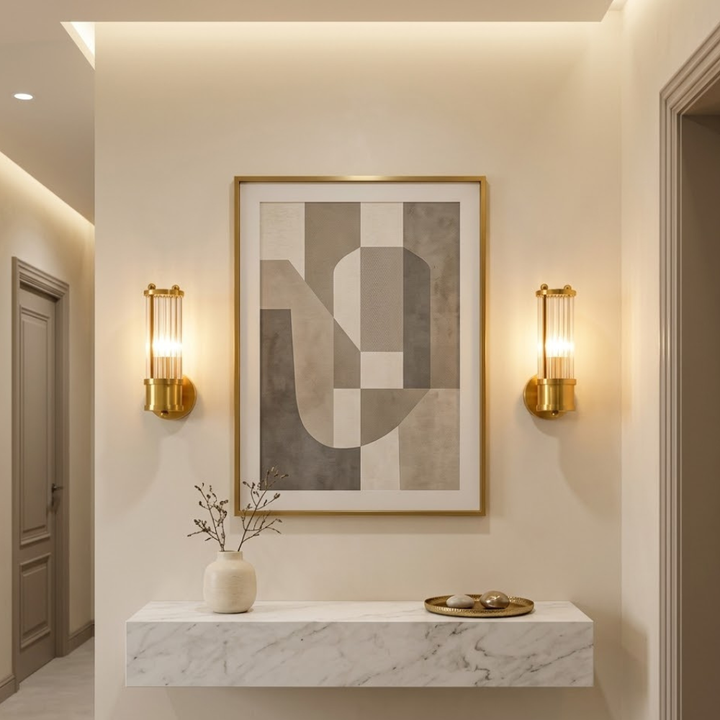 Iluminación interior: aplique LED dorado, ideal para baños con estilo moderno.
