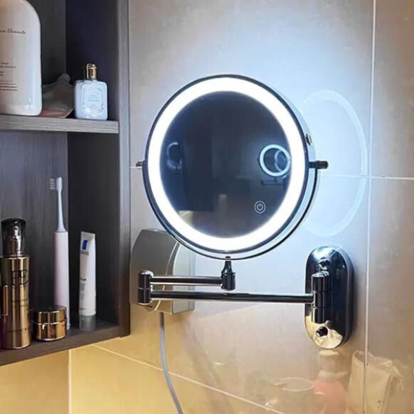 Espejo de aumento LED recargable negro para maquillaje y cuidado facial, con montaje en pared.