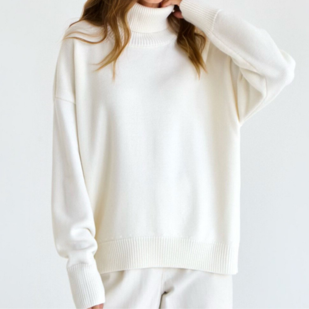 Mujer con jersey de cuello alto, look elegante y casual para invierno, máxima calidez y confort.