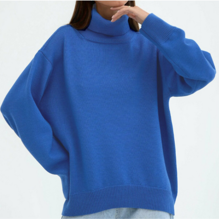 Moda invierno mujer: Jersey de cuello alto con manga larga, diseño cálido, versátil y sofisticado.