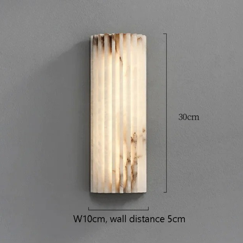 Aplique de pared minimalista moderno, ideal para iluminación de dormitorio.