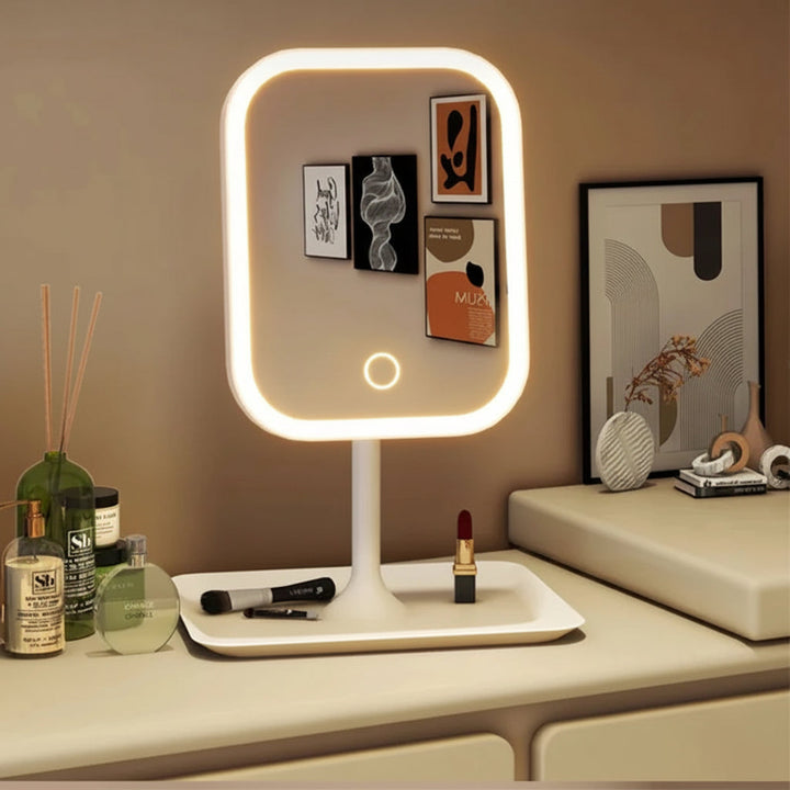 Espejo de maquillaje LED táctil blanco con luz regulable, ideal para tocador y belleza.