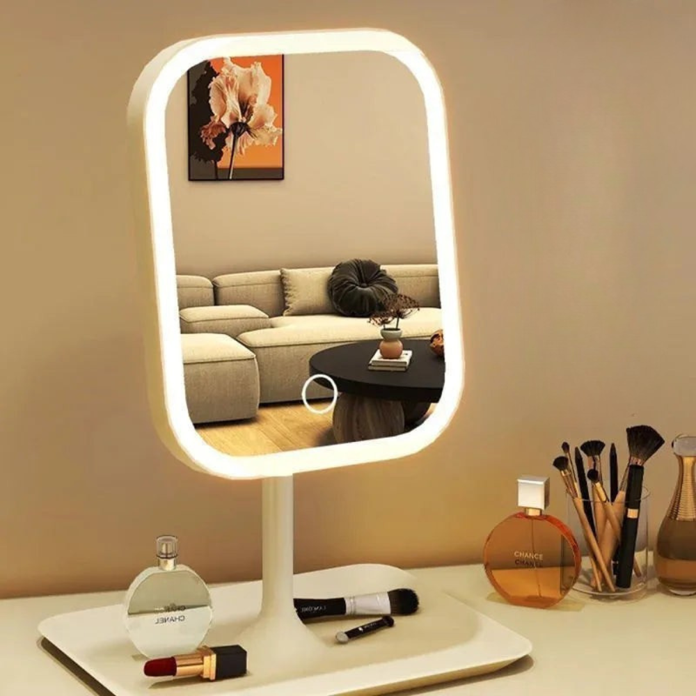Espejo iluminado LED para maquillaje, recargable y táctil, con luz regulable para una belleza impecable.