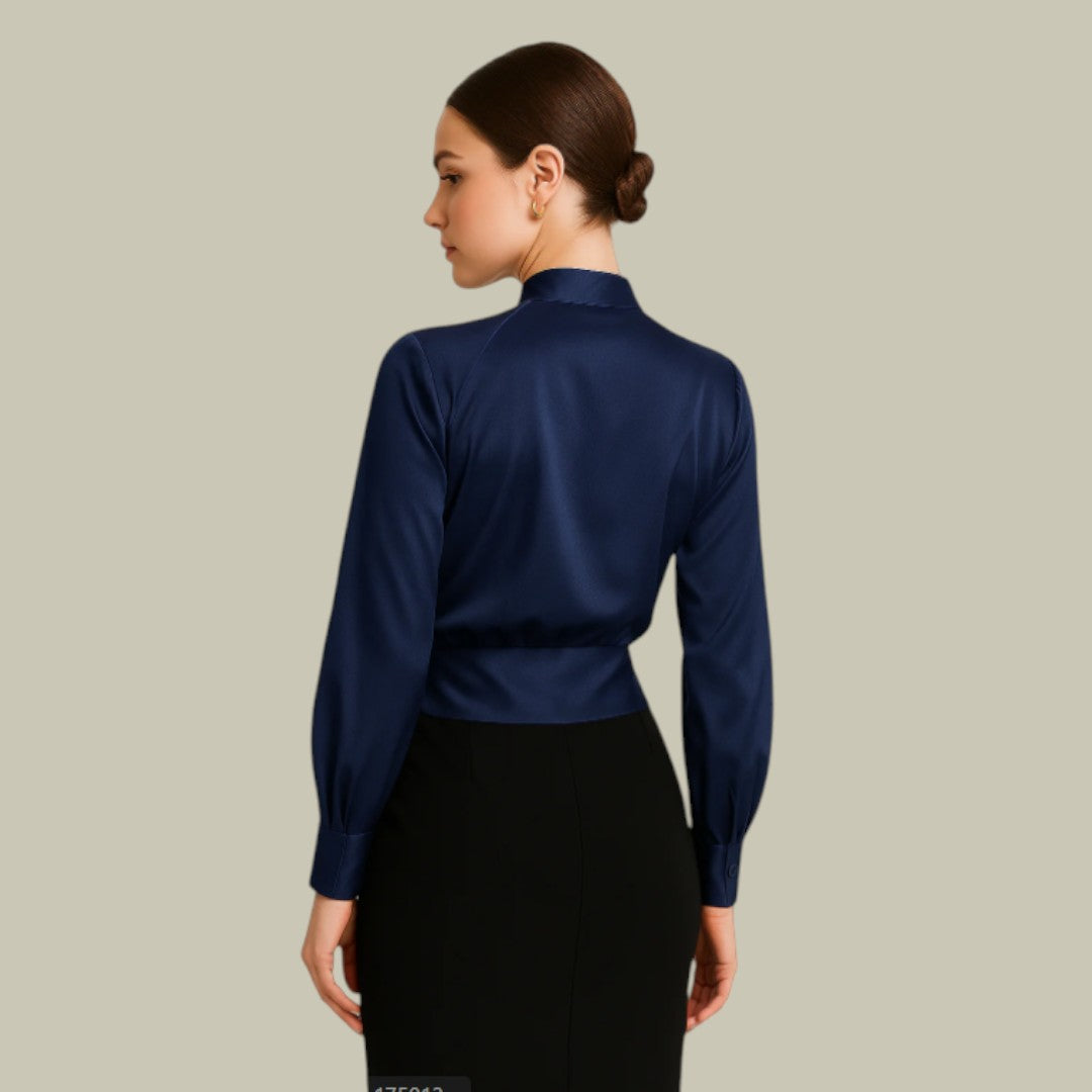 Blusa de mujer envolvente y elegante. Cuello camisero y manga larga. Versátil para moda casual, fiesta u oficina.