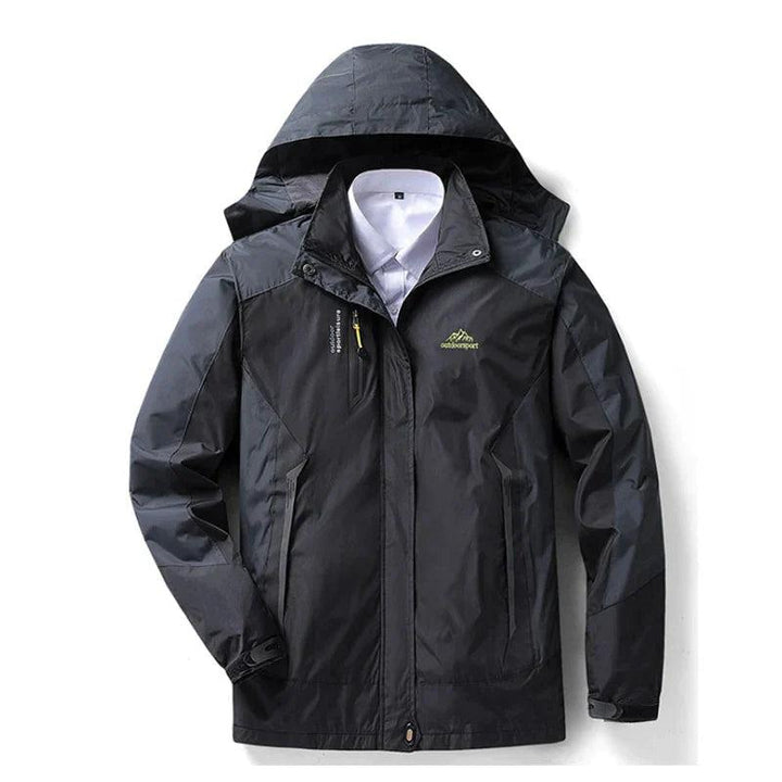 Detalle tela chaqueta impermeable mujer, material cortavientos y térmico. Protección duradera contra lluvia y frío extremo.