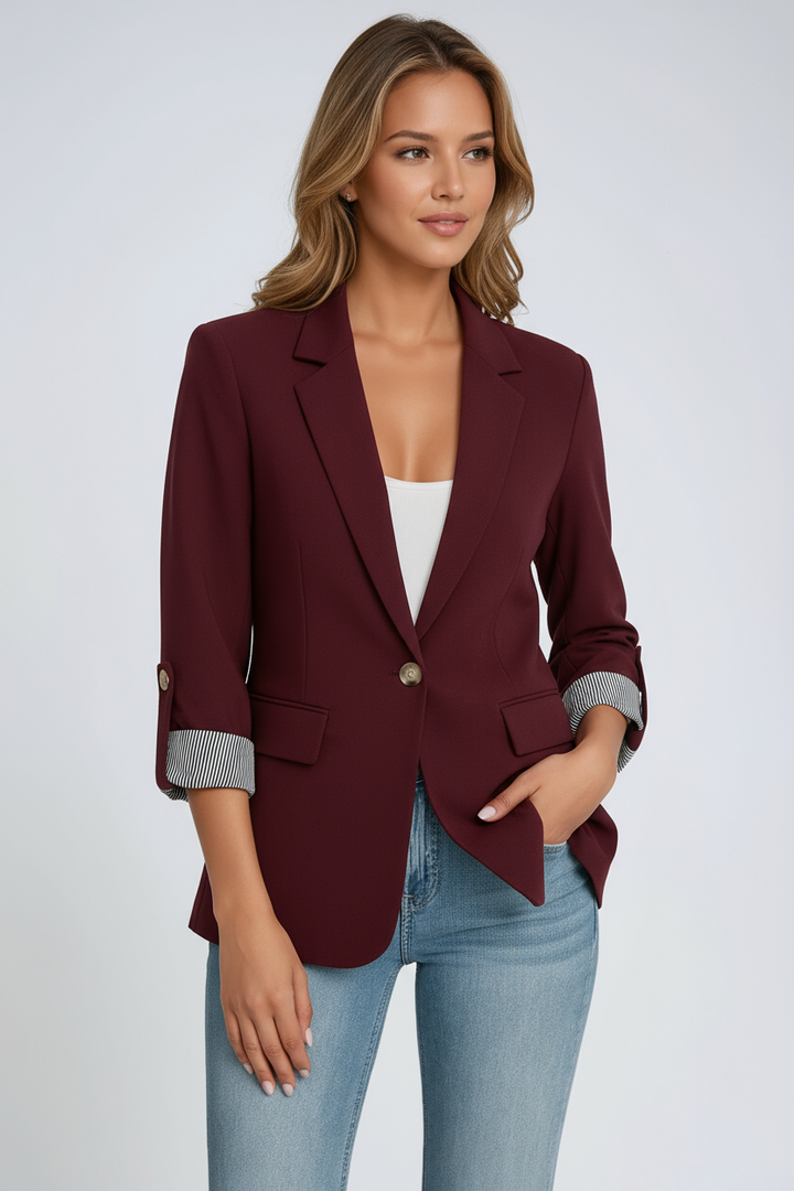 Chaqueta blazer de mujer con detalle sofisticado en manga. Perfecta para primavera-otoño.