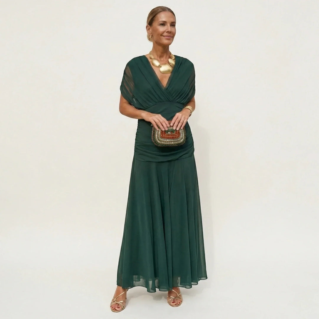 Vestido largo elegante para invitada de boda, diseño de hombros descubiertos.