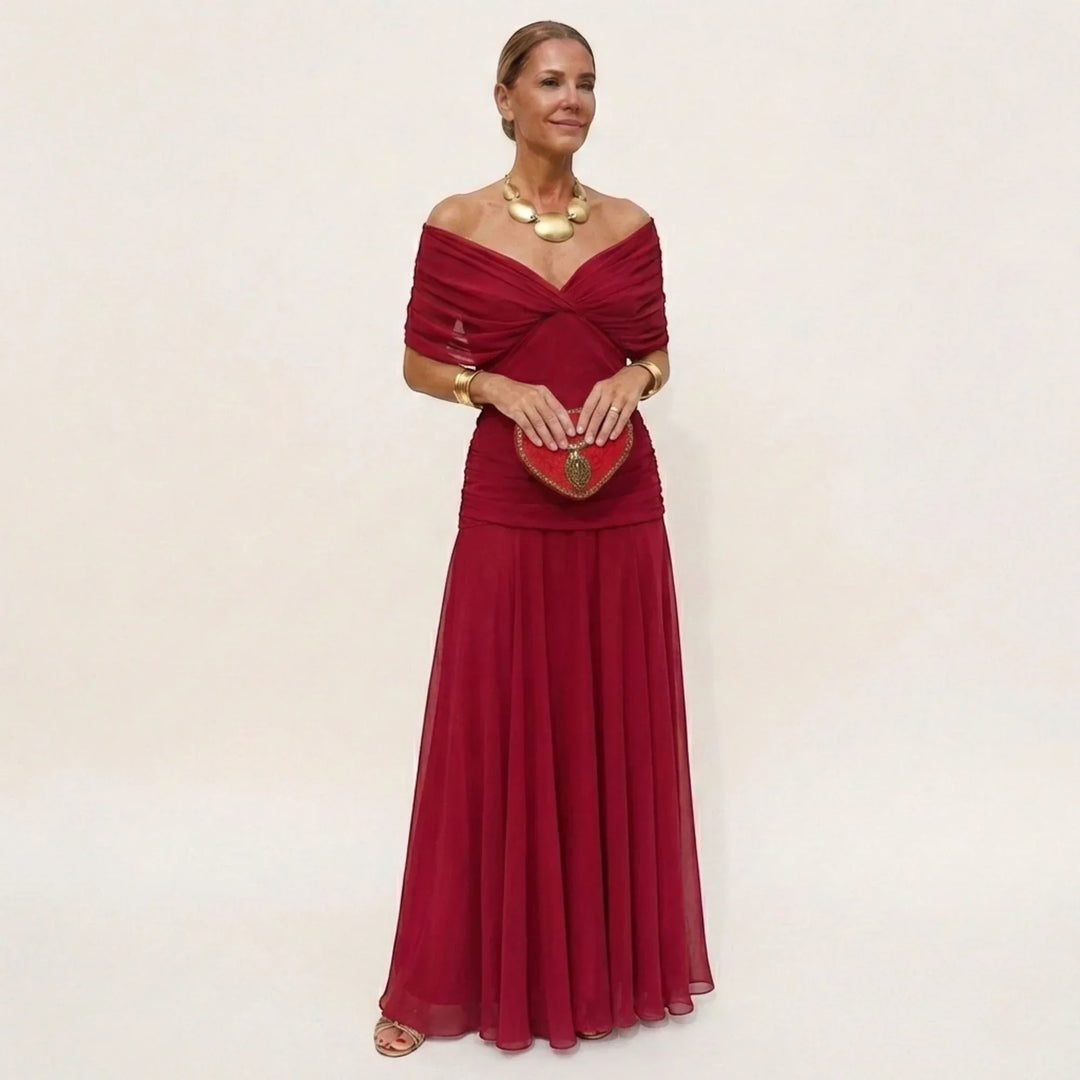 Moda femenina: vestido largo elegante con hombros descubiertos, perfecto para fiesta y gala.