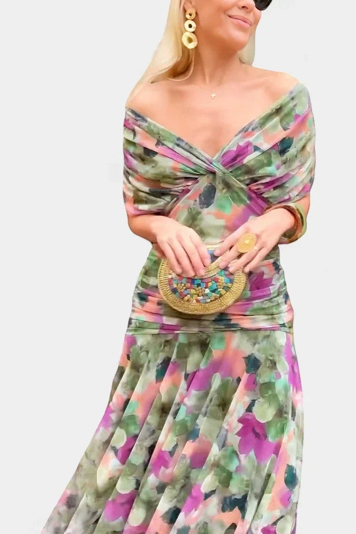 Vestido de noche para gala o celebración, largo y elegante con hombros descubiertos.
