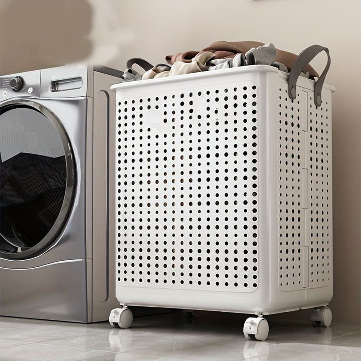 Cesto de lavandería plegable con ruedas. Solución de almacenamiento fácil de mover para ropa sucia en casa.