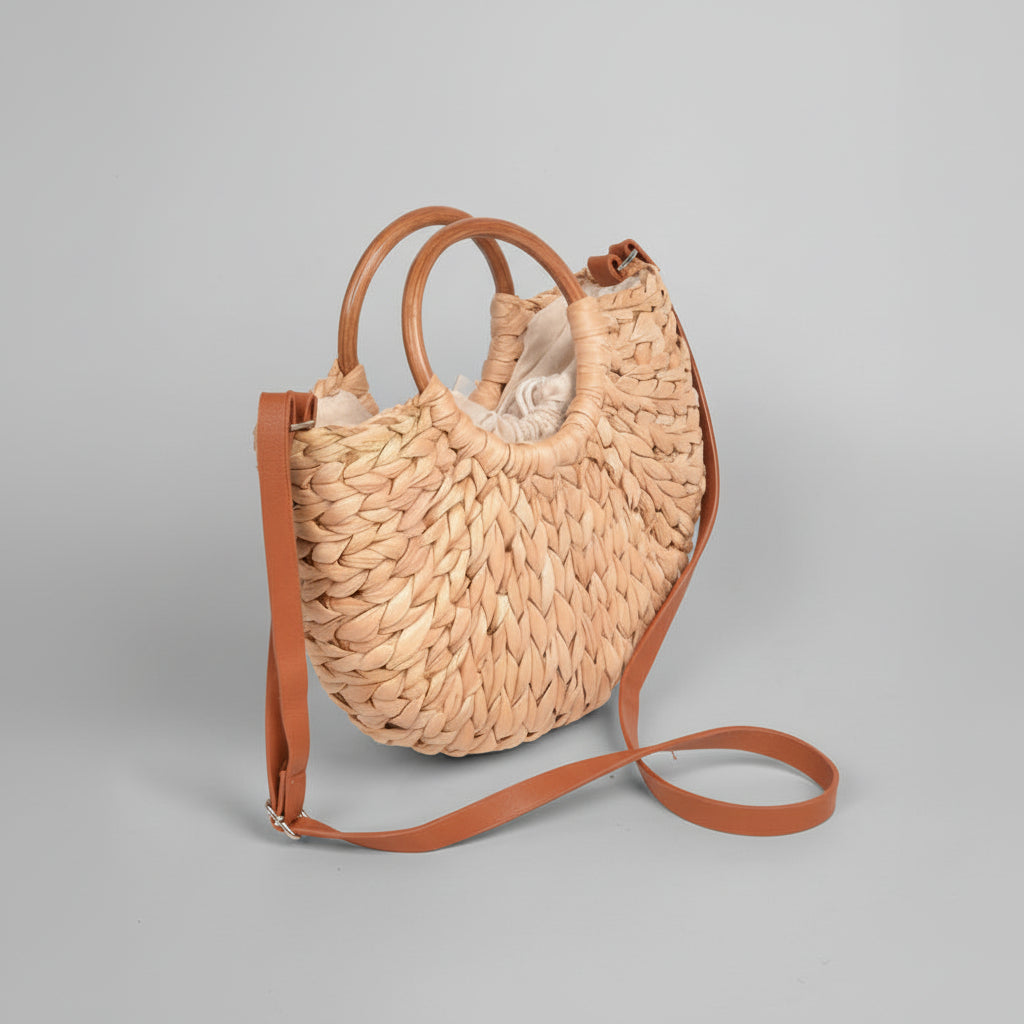 Bolso de paja estilo casual-elegante, color almendra natural, con detalle de nudo. Perfecto para mujer en verano.