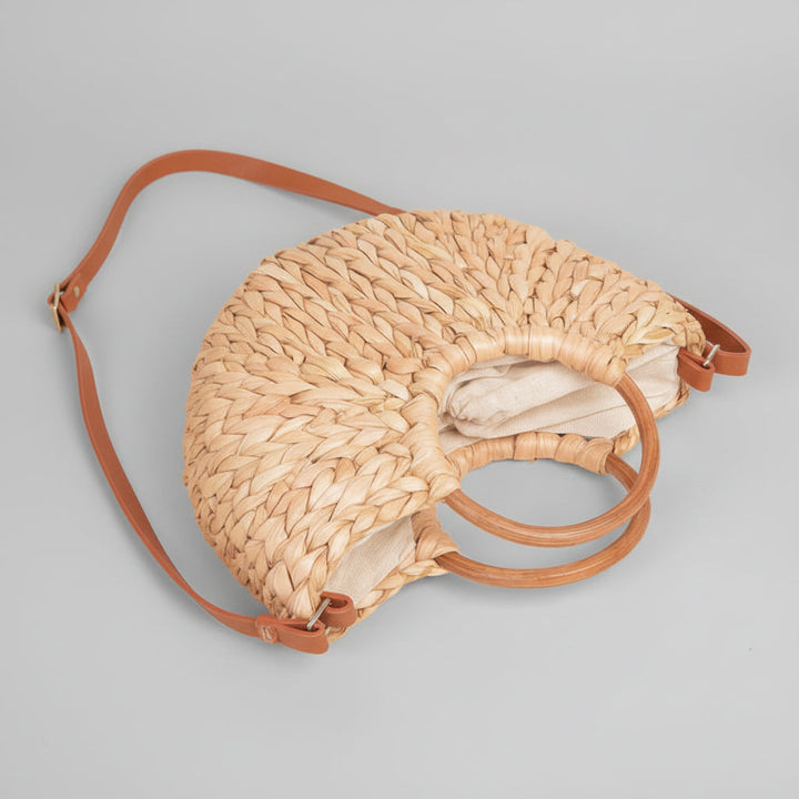Bolso de mano de paja para mujer con nudo torcido, color natural. Versátil y elegante para el verano.