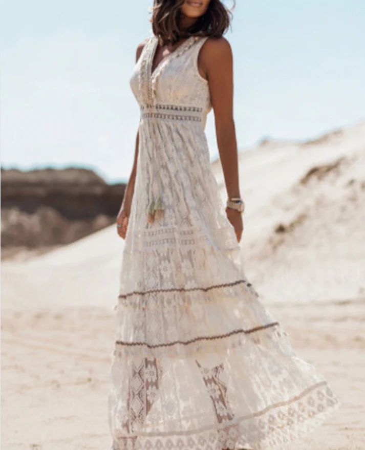 Vestido bohemio blanco sin mangas para mujer, ideal para verano casual. Maxi fluido y cómodo.