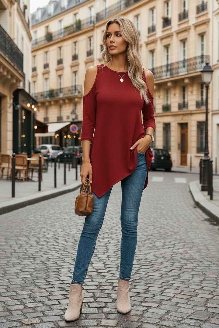 Elegante blusa mujer asimétrica de hombros descubiertos, ideal para looks casuales o formales.