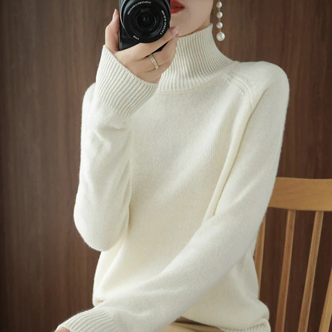 Jersey cuello alto de mujer, cálido y elegante para invierno. Suéter sofisticado, ideal para bajas temperaturas.