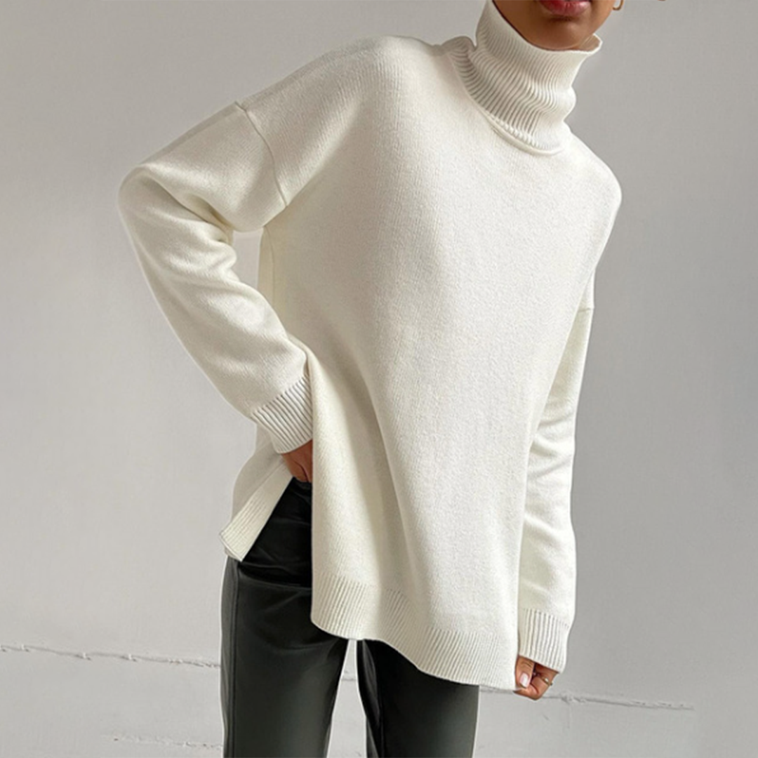 Estilo moderno: jersey cuello alto de mujer con abertura lateral. Ideal para looks chic.