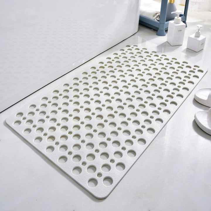 Alfombra de ducha grande antideslizante, proporciona agarre seguro y confort, ideal para prevenir accidentes en el baño.